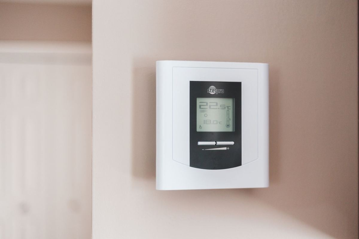 Thermostat on a home wall, set for a cool house